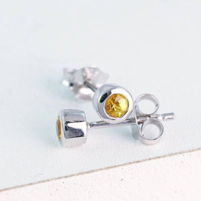 EQUALLI BEZEL SET EARRINGS IN STERLING SILVER
