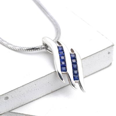 OLIVIA BLUE SAPPHIRE DOUBLE SWIRL PENDANT IN STERLING SILVER BY EQUALLI.COM