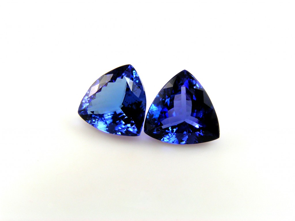 Tanzanite gemstones on white background.